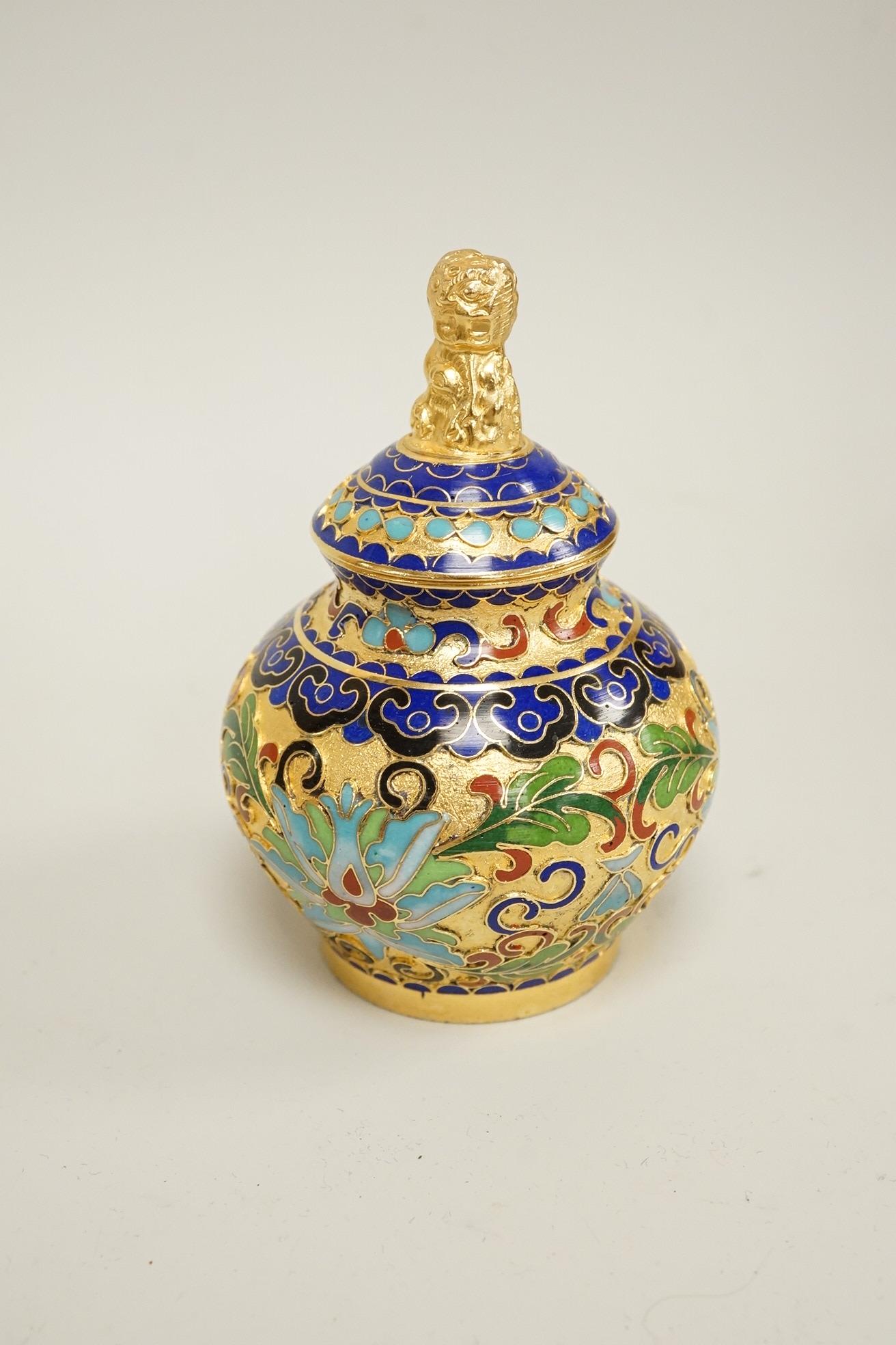 A collection of miniature enamel and cloisonné boxes, eggs and a painted rabbit, etc. (11)